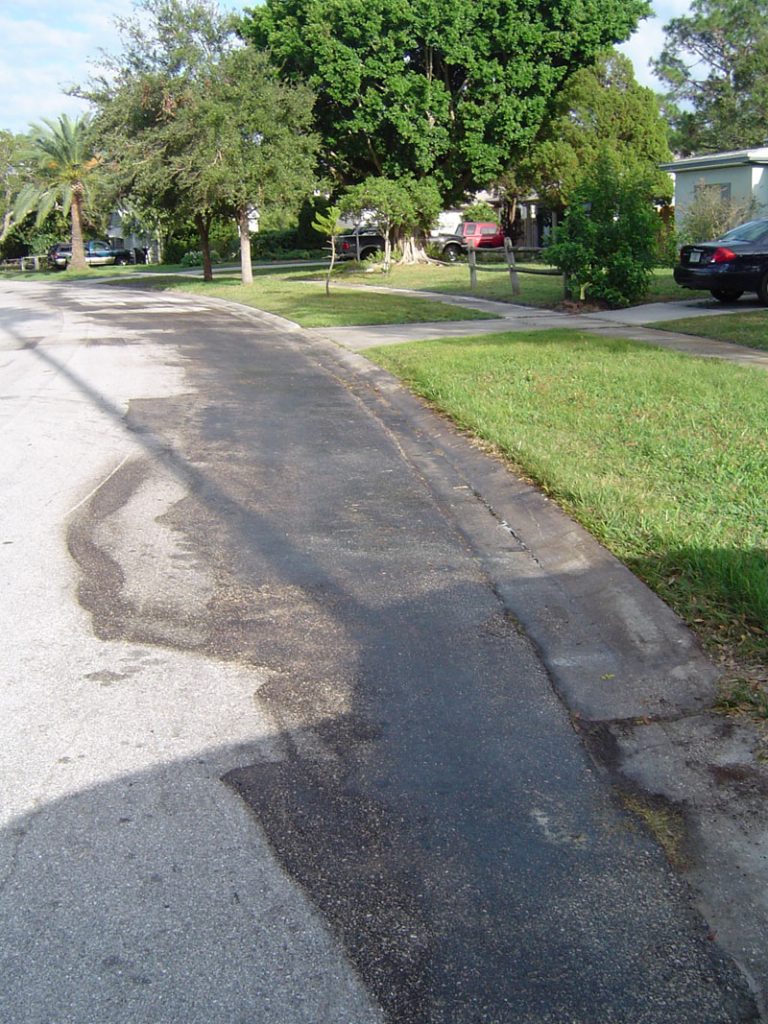Hydraulic Fluid Stain Street Cleaning Before